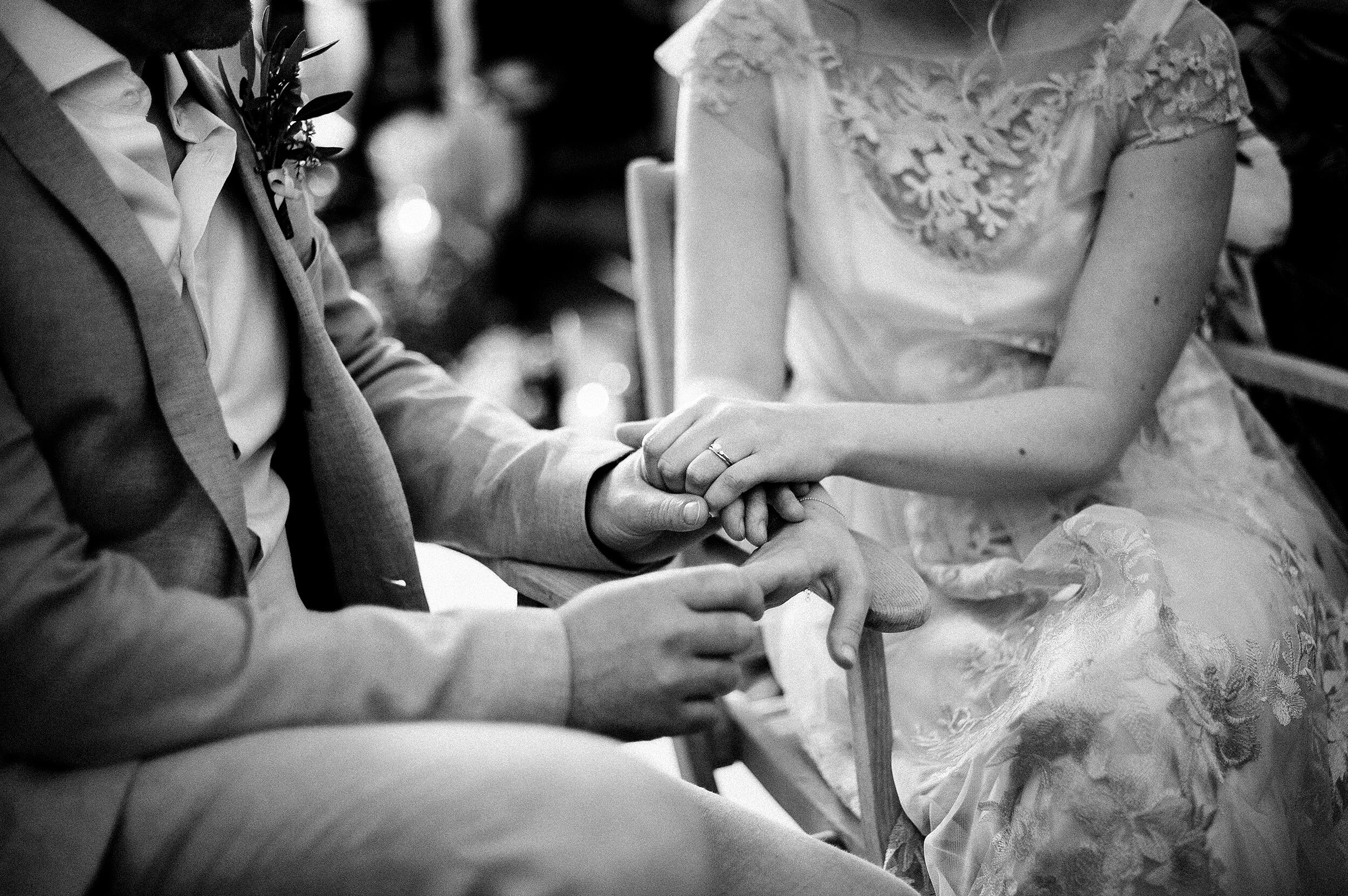 villa piovene wedding villa godi malinverni bride and groom holding hands in the church