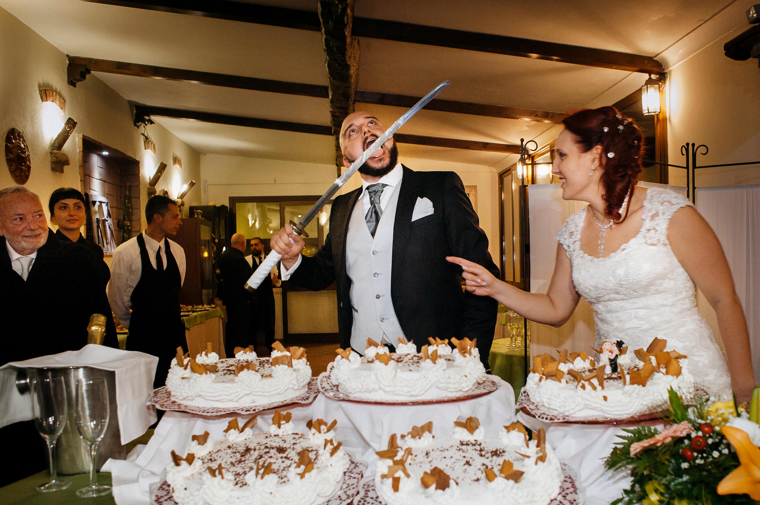 wedding cake cutting with a katana