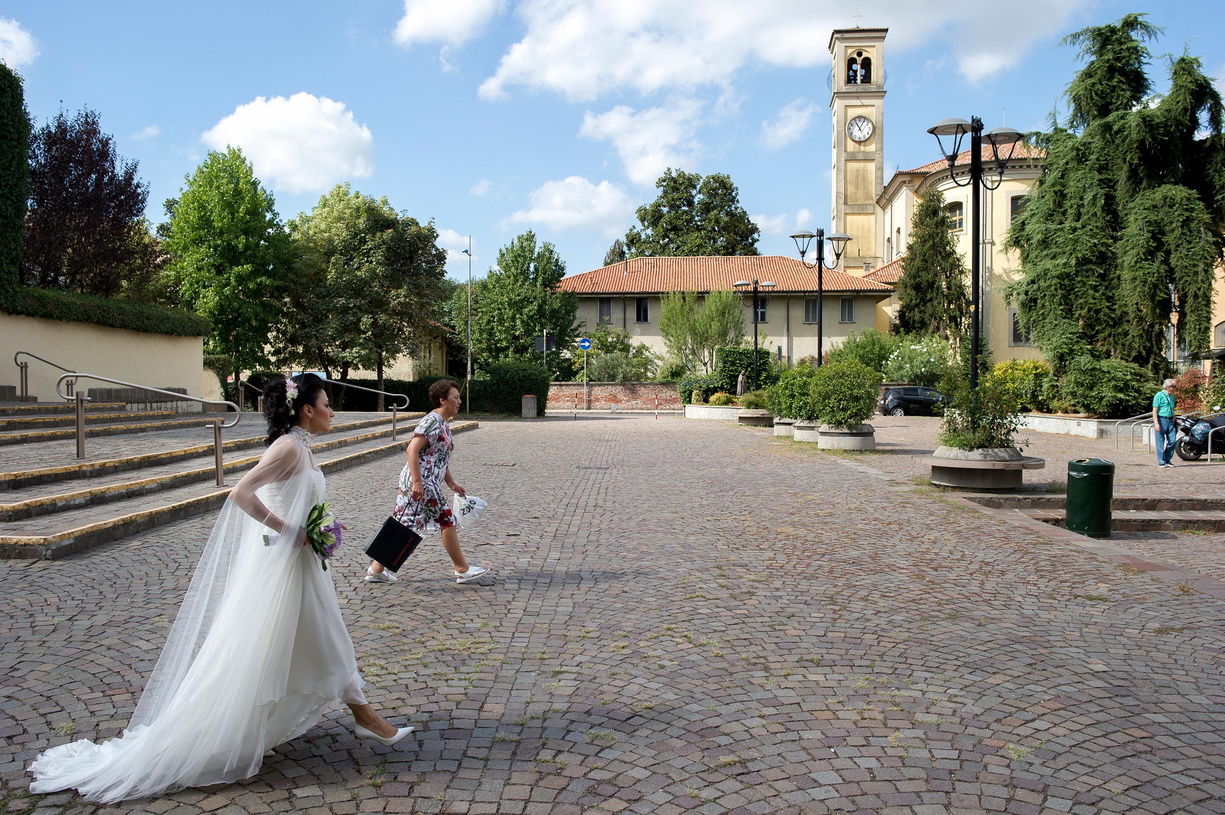 the bride and her mom doing the same step at the same time