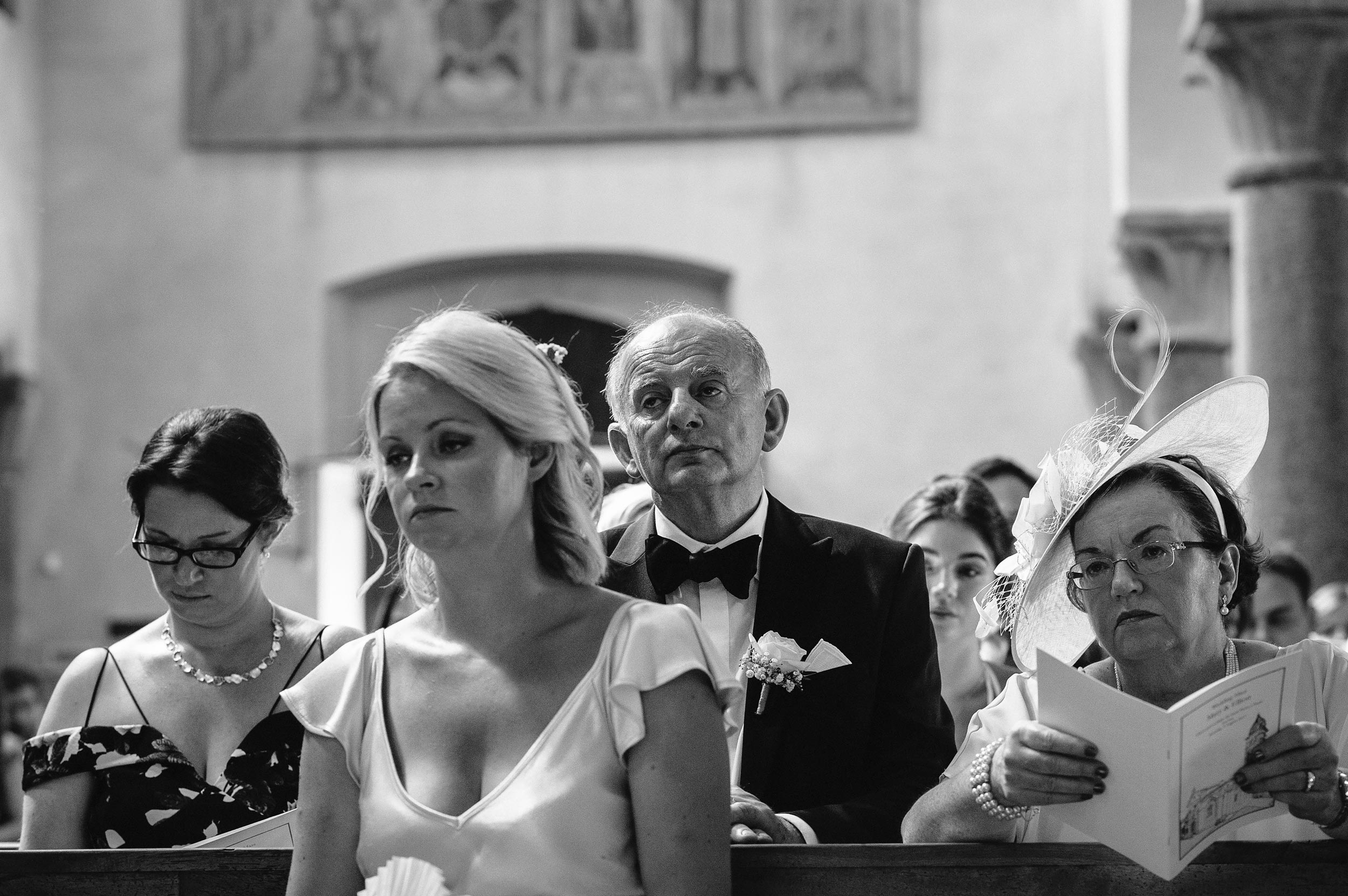 bored guests ceremony black and white wedding photography
