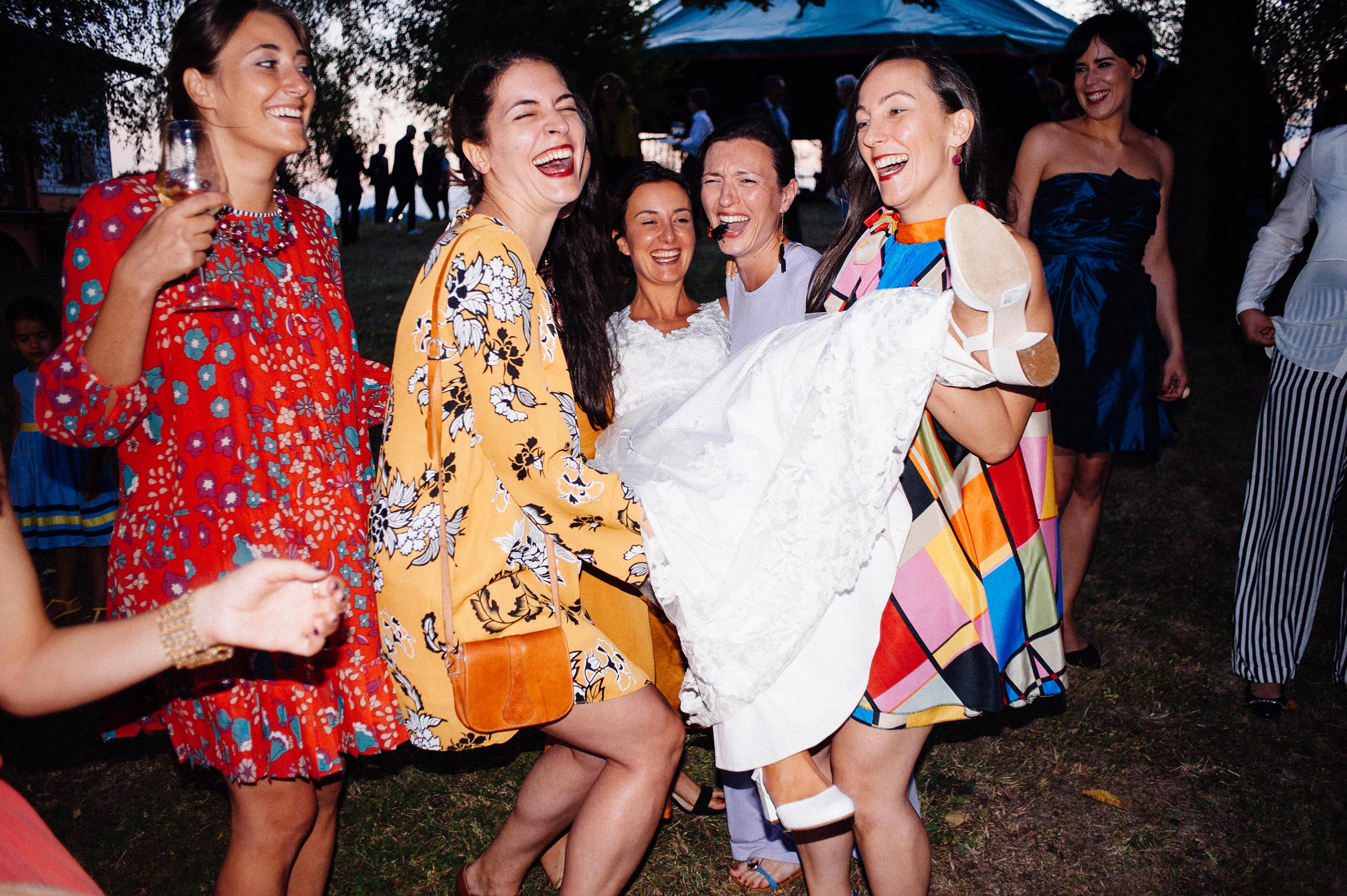 bridesmaids and friends play with the bride film style color wedding