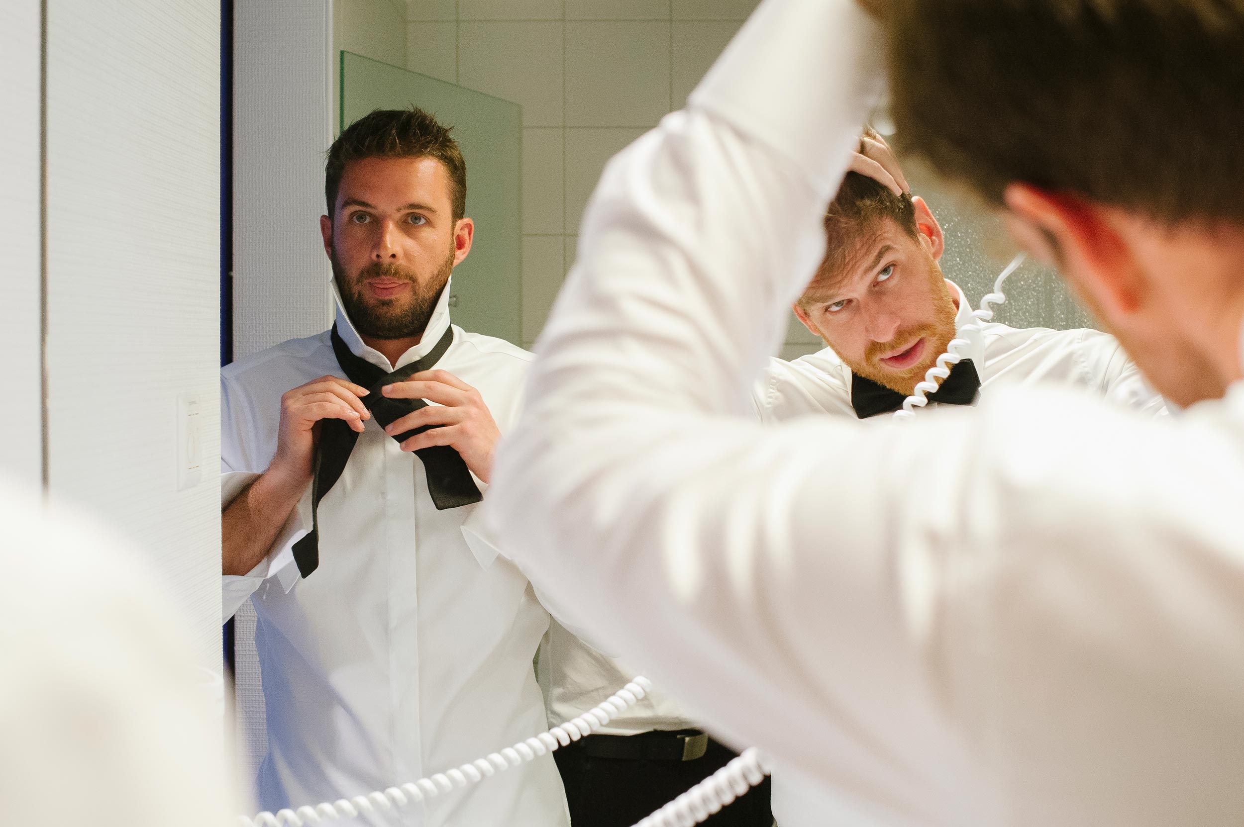 groom getting ready drying hair wedding ascona lake maggiore switzerland