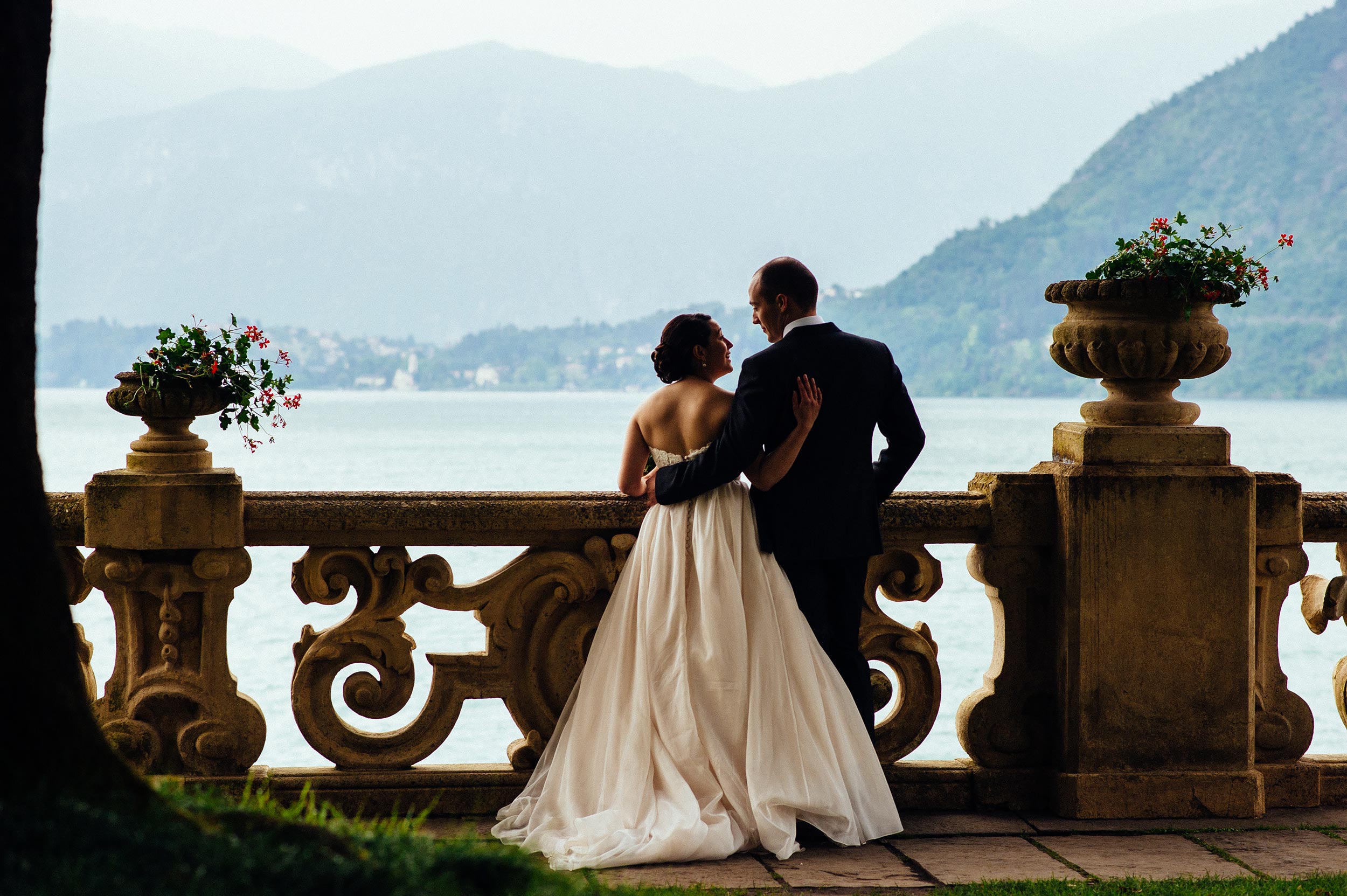 bride and groom looking balcony Villa Del Balbianello Bellagio Lake Como Wedding Photographer Italy Alessandro Avenali
