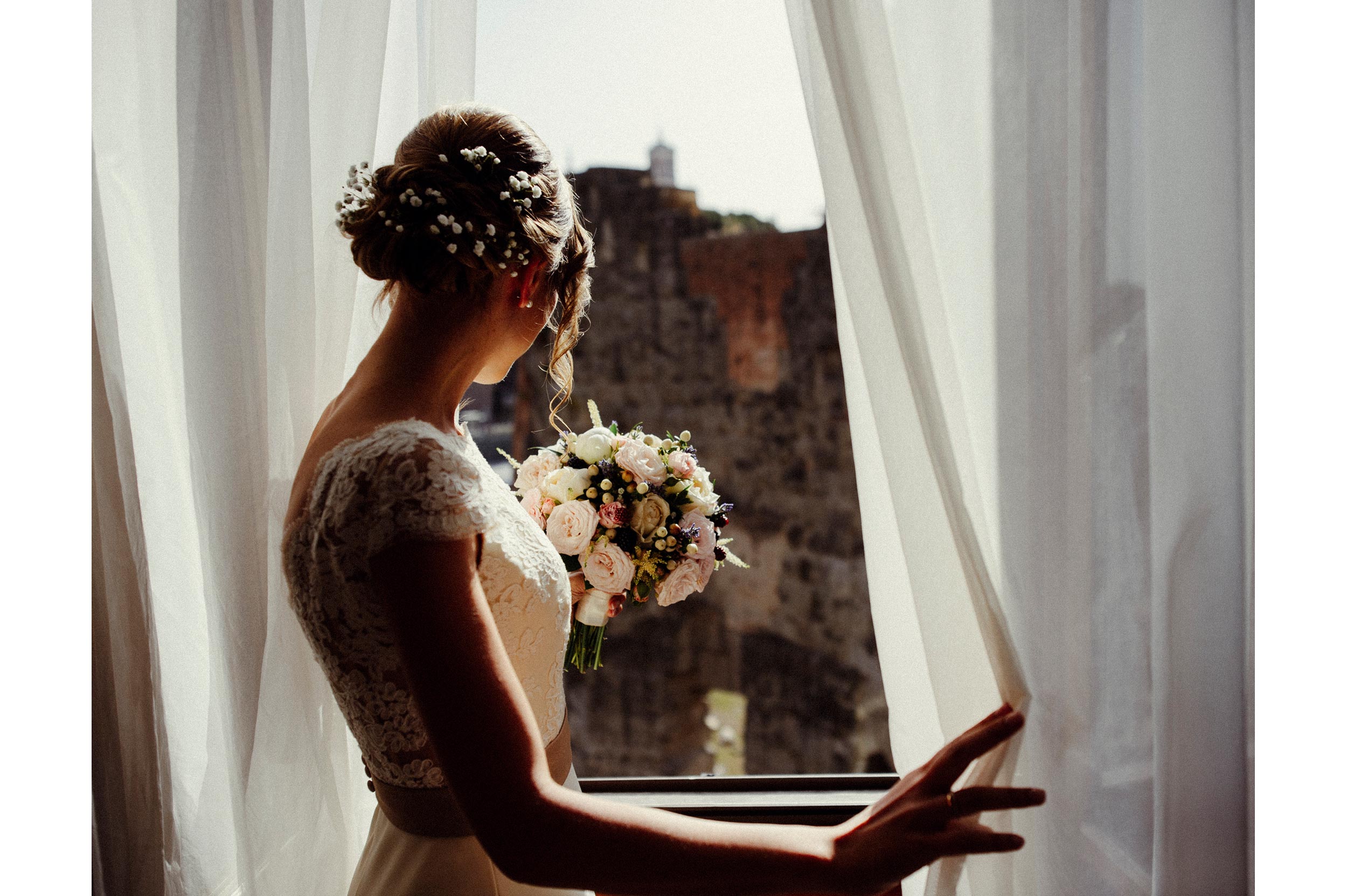 Roman Forum Rome Wedding Photographer Alessandro Avenali Bride at the Window with Bouquet