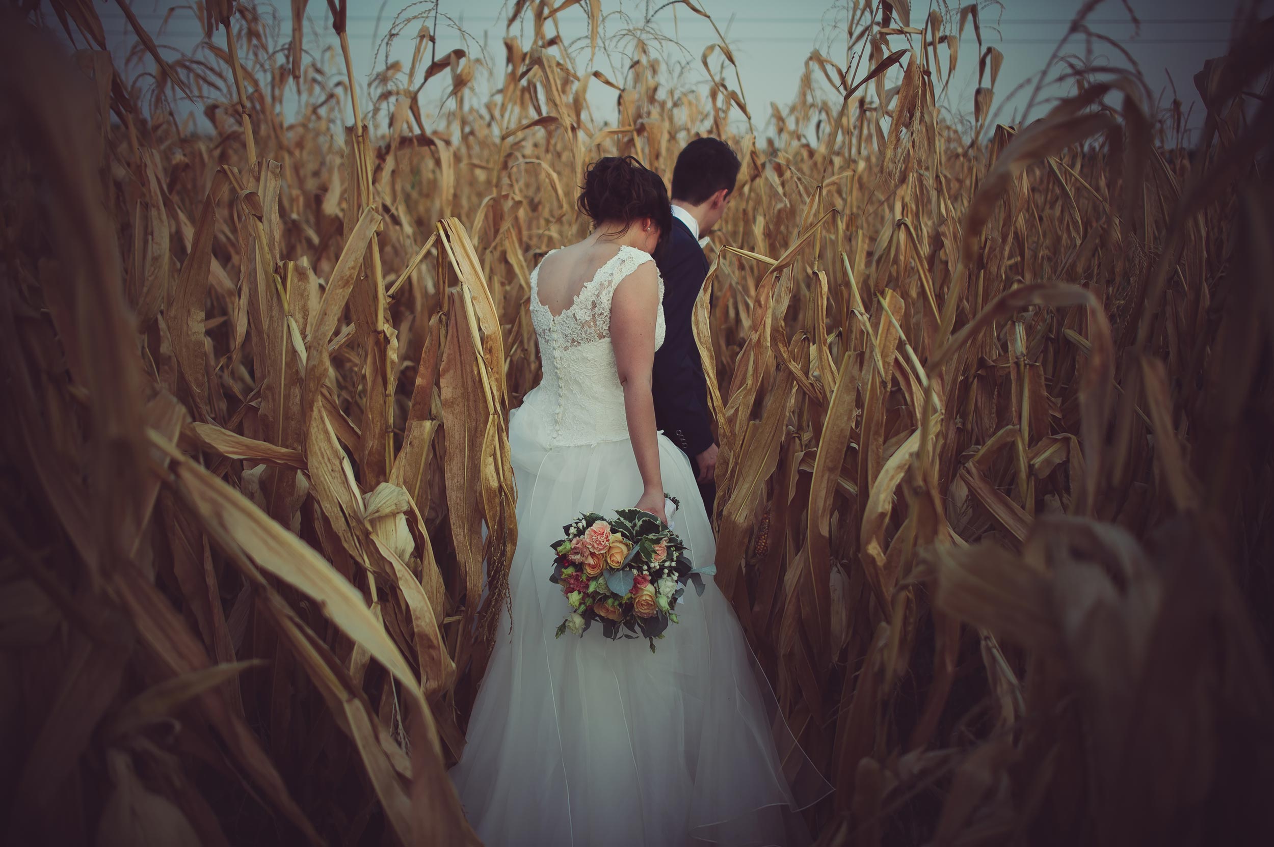 romantic orange teal bride and groom portrait in the woods looks like film vsco